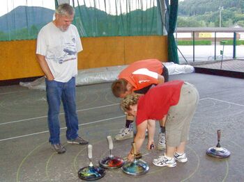 Stockschießen - genaues messen